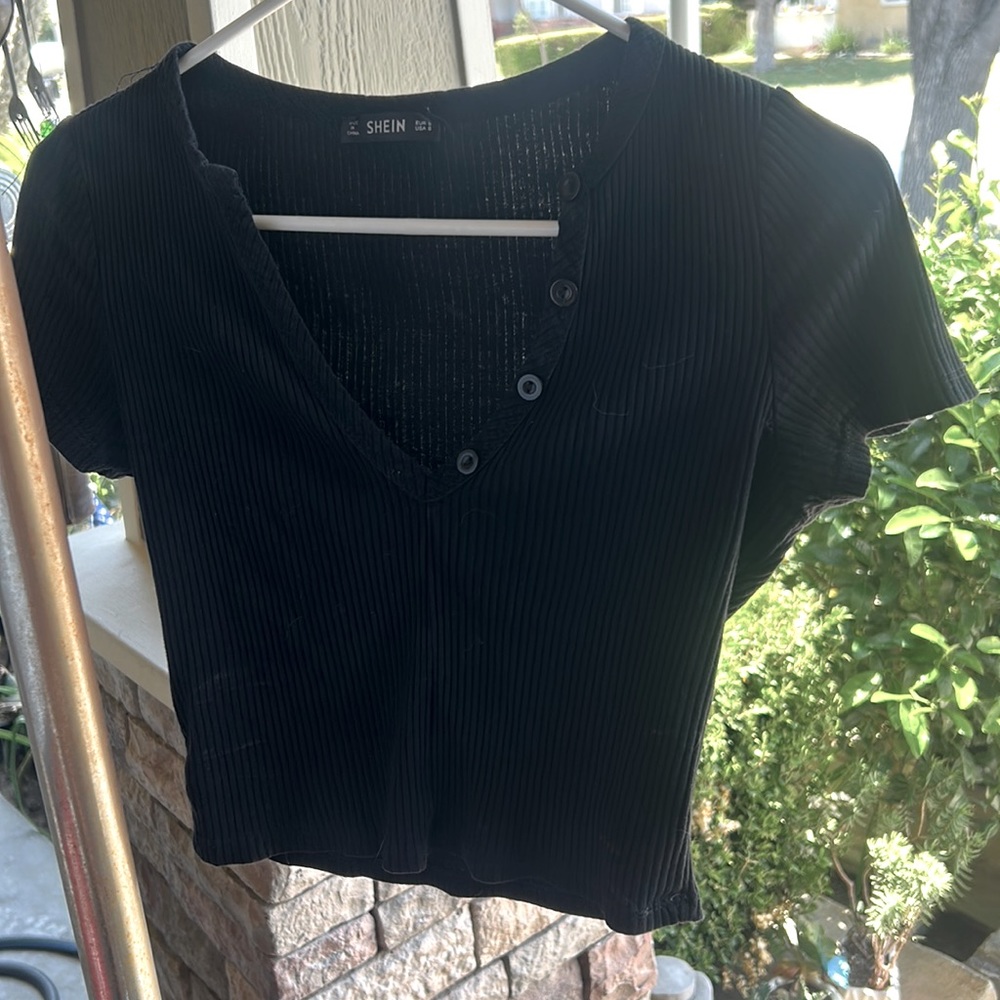 Super cute black opened button shirt